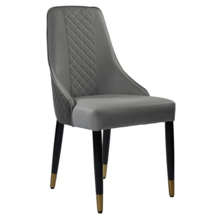 Side view of Ascot leather dining chair, featuring sleek silhouette and high-quality leather