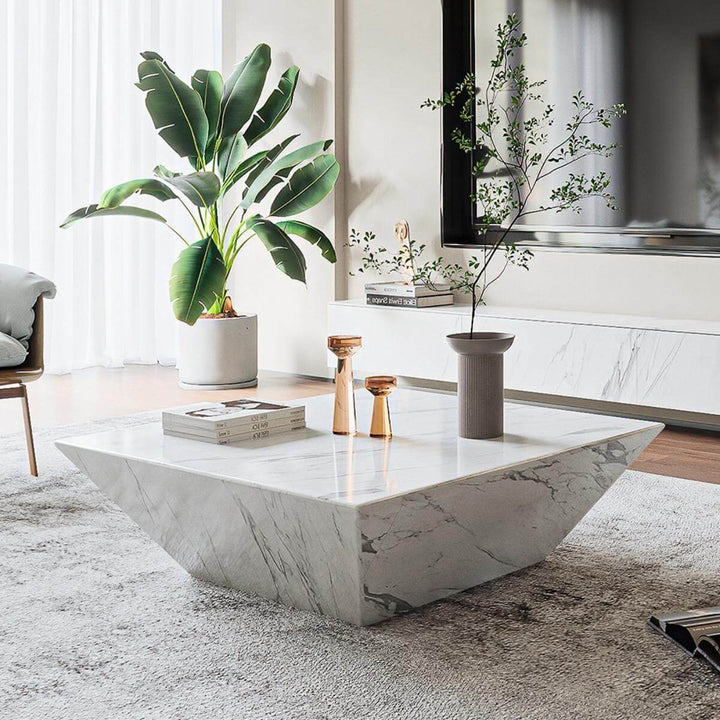 Calcutta coffee table with natural marble top featuring elegant design and luxurious finish