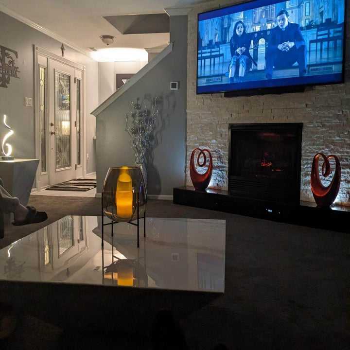 Calcutta coffee table with natural marble top in a modern living room with elegant interior design