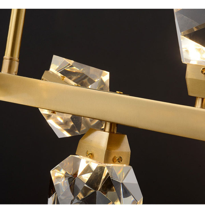 Detail view of Emerald Light LED gold chandelier in elegant Australian interior – intricate craftsmanship with glowing LEDs
