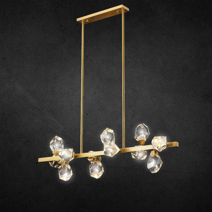 Front view of Emerald Light LED gold chandelier with lights on – glowing warm illumination in elegant interior