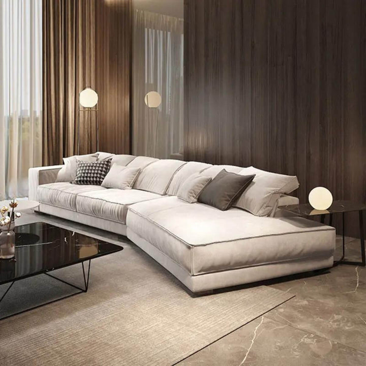 White side view of Italian gray fabric sofa in Australia – modern design with soft upholstery and comfortable seating