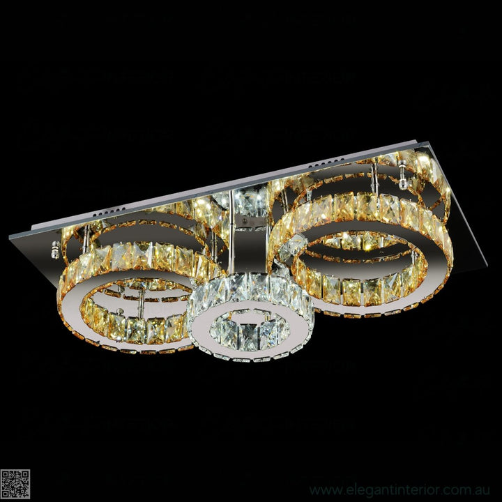  Side view of Jennifer flush mount light in elegant interior, featuring crystal detailing and gold accents