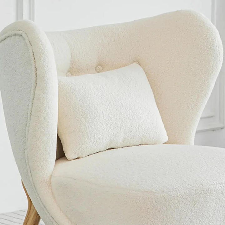 Backrest detail view of lamb wool accent armchair in Australia highlighting cozy texture