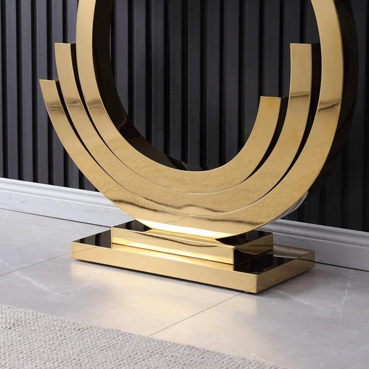 Close view of Lidia console table stand in black and gold – highlighting sturdy frame with luxurious finish and modern design