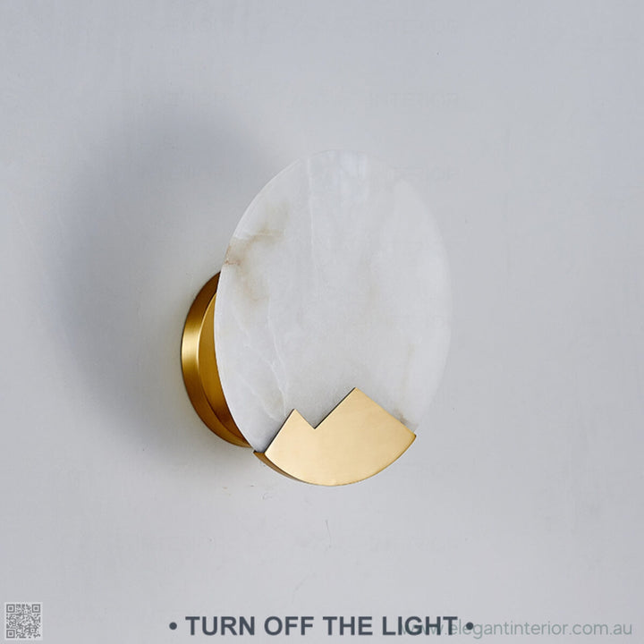 Side view of Marmar wall light, showcasing copper body and natural marble lampshade