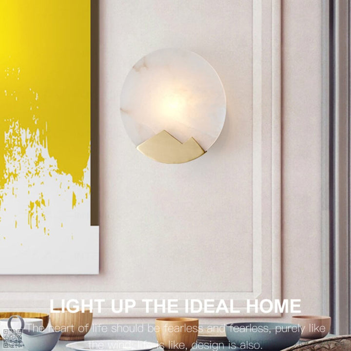 Front view of Marmar wall light, featuring elegant marble shade and polished copper body