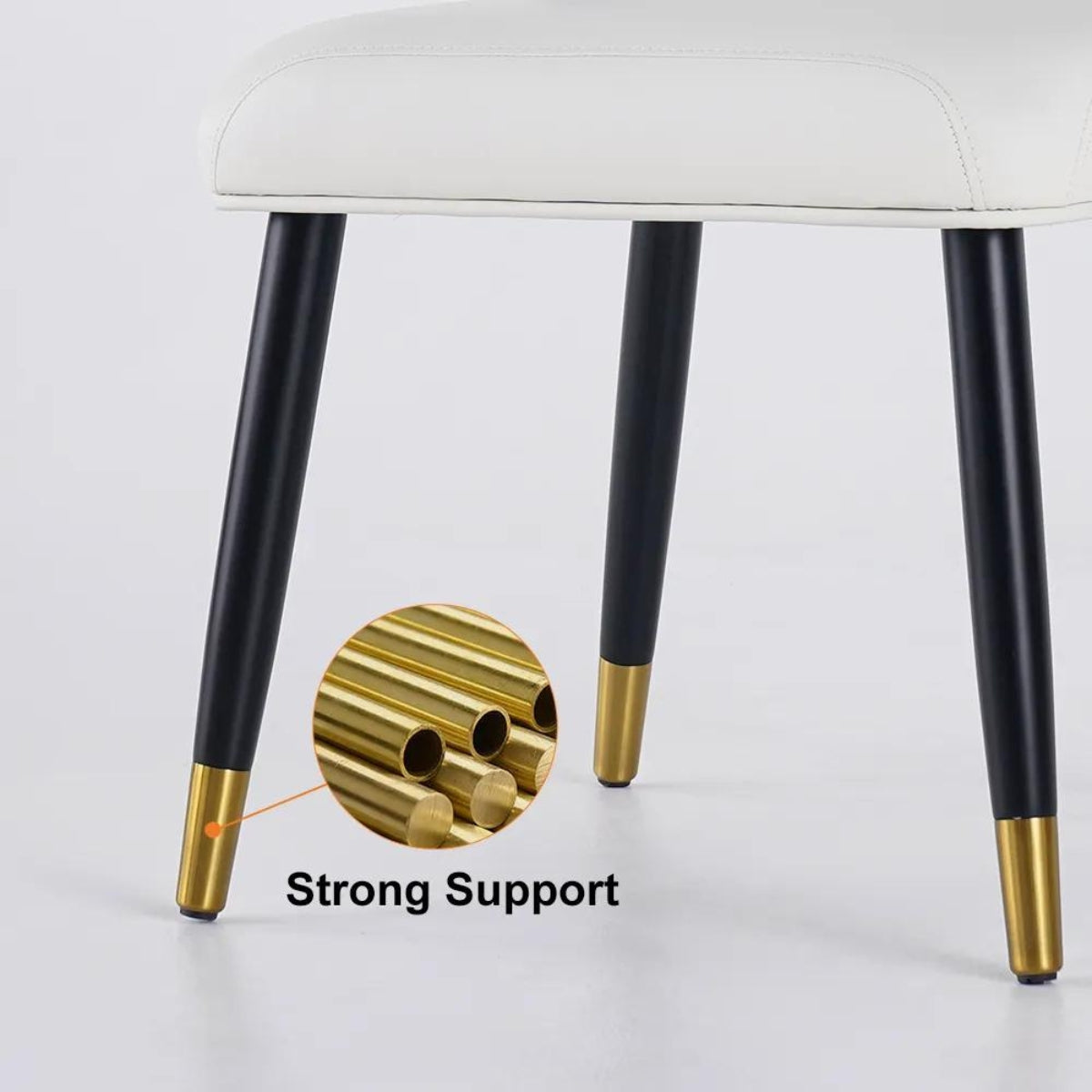 Modern beige and black dining chairs standing with strong support and sturdy design