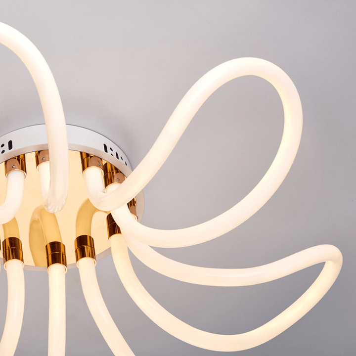 Partial detail view of Rio chandeliers with golden light – elegant craftsmanship and luxurious design