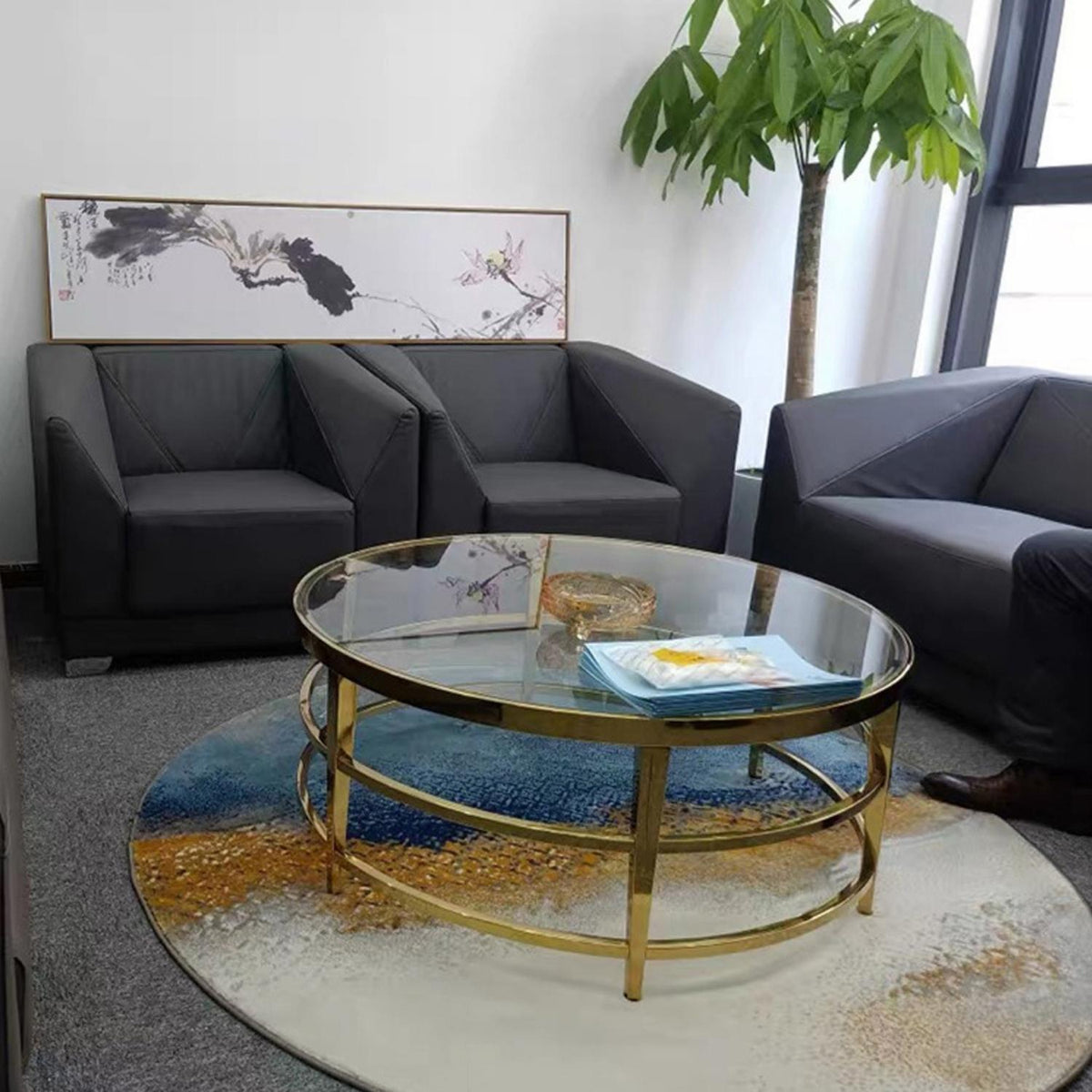 Rose luxury coffee table in living room – stylish glass top with gold base, enhancing modern elegant interior design