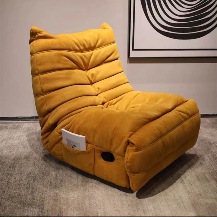 Side angle view of yellow rotational recliner armchair showcasing modern comfort design