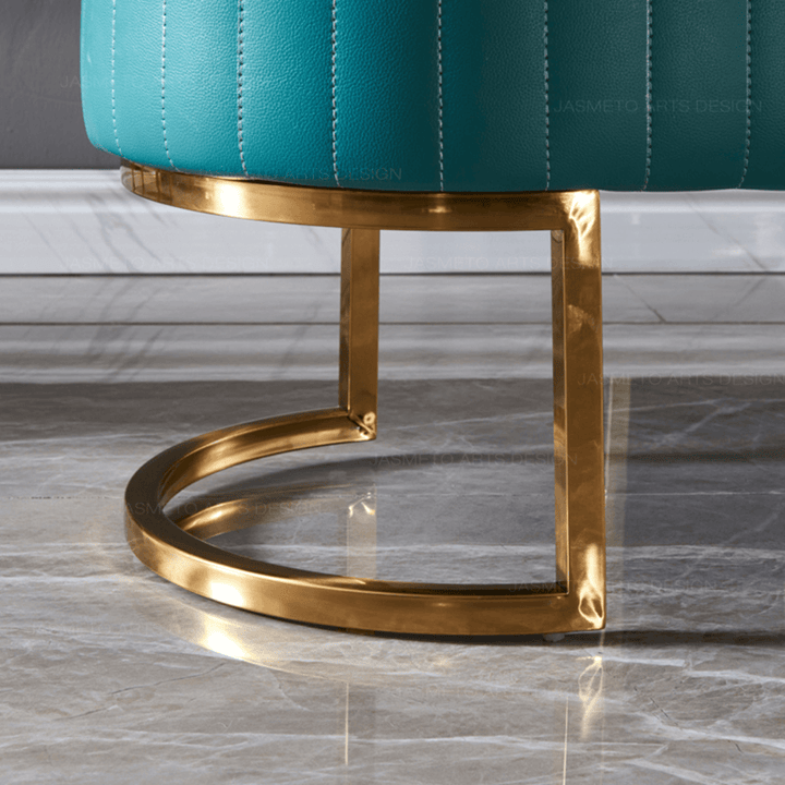 Stand detail of Shell leather oval bench with golden half-moon base, elegant sturdy support
