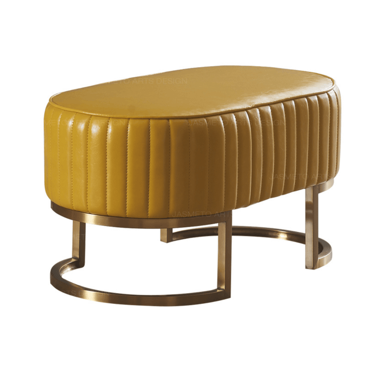 Side view of Shell leather oval bench with golden half-moon base, sleek and elegant design