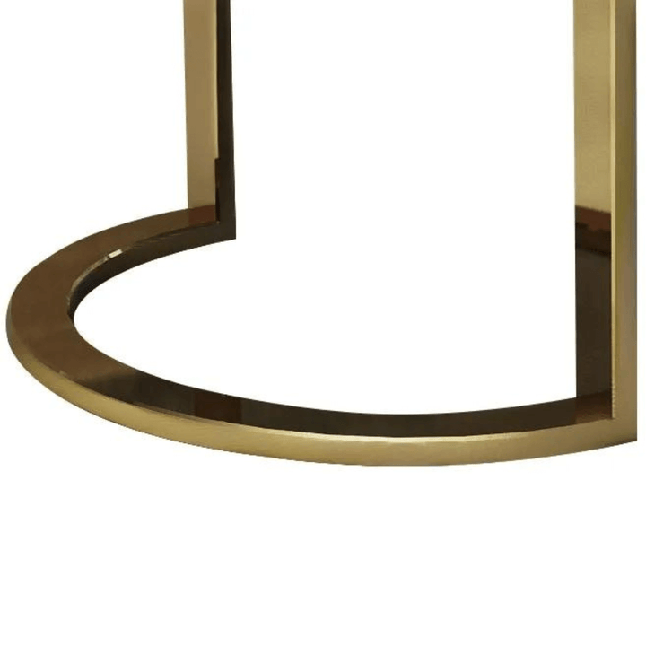 Stand detail view of Shell leather oval bench with golden half-moon base, elegant craftsmanship