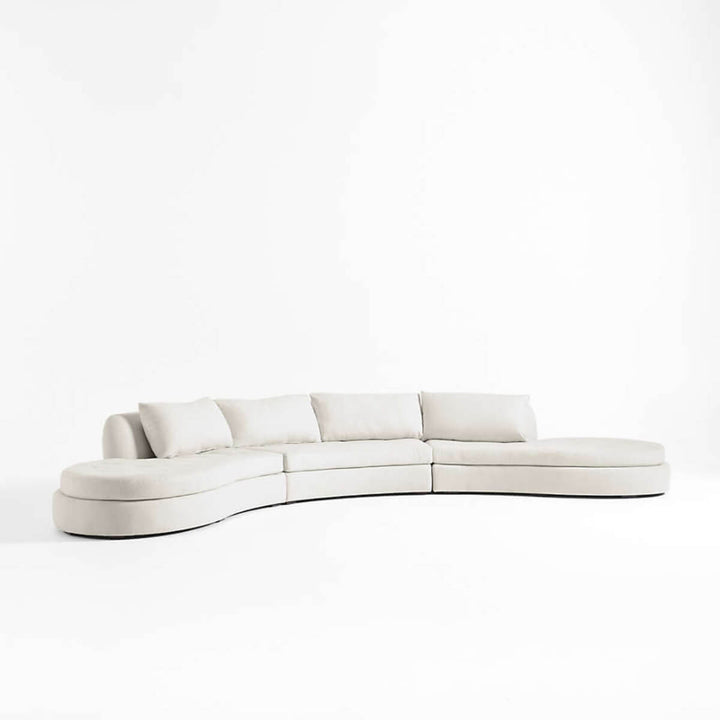 Front view of sinuous curved sofa in Australia – elegant modern seating with smooth flowing design