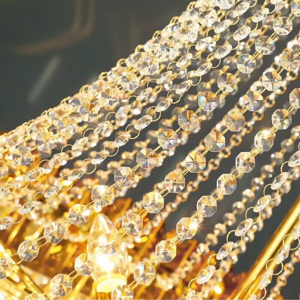 Crystal ball detail view of Tara chandelier in elegant Australian interior – highlighting sparkling crystal accents with warm, luxurious lighting