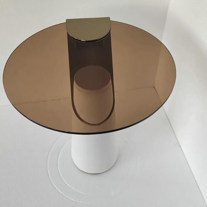 Top view of tempered glass side table – modern design with polished clear glass surface and compact frame