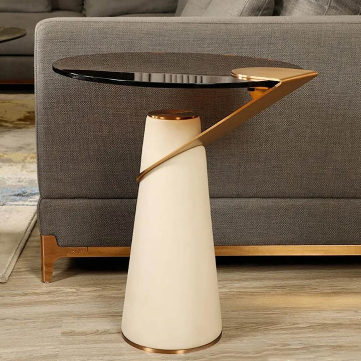 Side view of tempered glass side table beside sofa – modern compact table with clear glass top for stylish living spaces