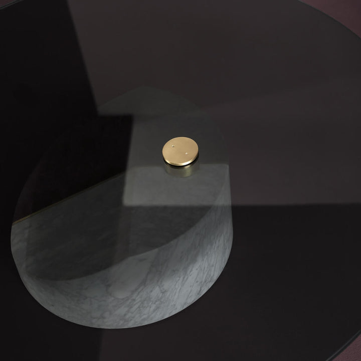 Detail view of tempered glass top table set – close-up of clear glass surface and frame detailing in modern design