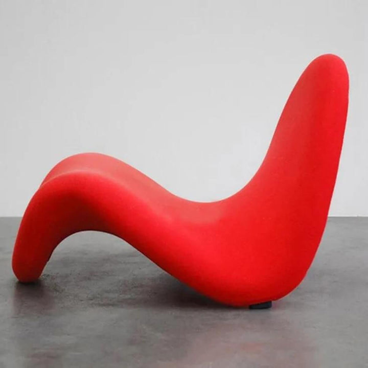 Side view of red Tongue lounge chair in Australia showcasing vibrant color and sleek design