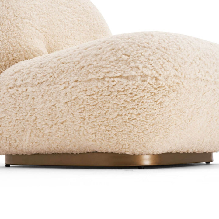 Close-up base detail view of wool accent armchair in Australia highlighting sturdy design