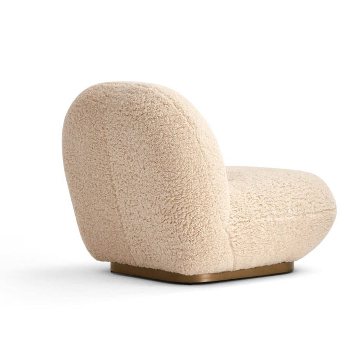 Back side angle view of wool accent armchair in Australia showcasing cozy texture and design