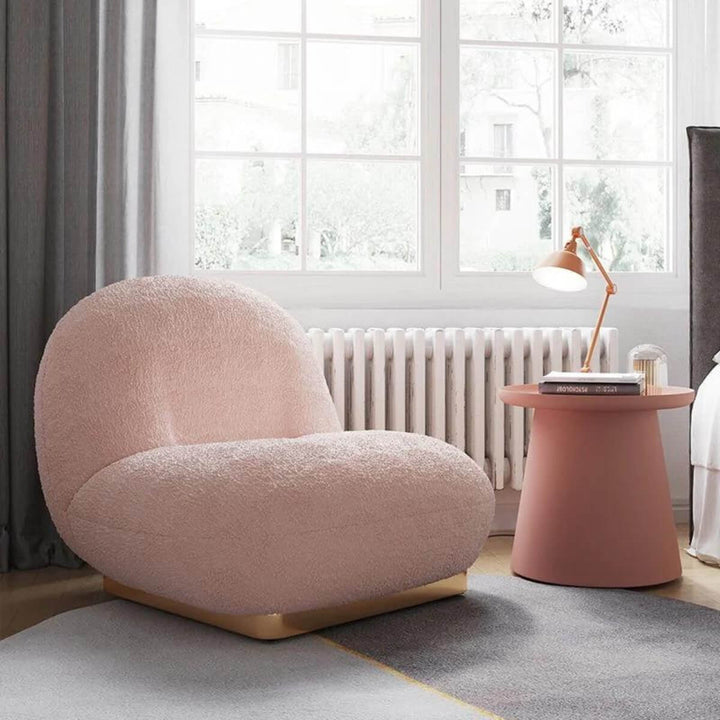 Side view of wool accent armchair in Australia highlighting cozy texture and modern design