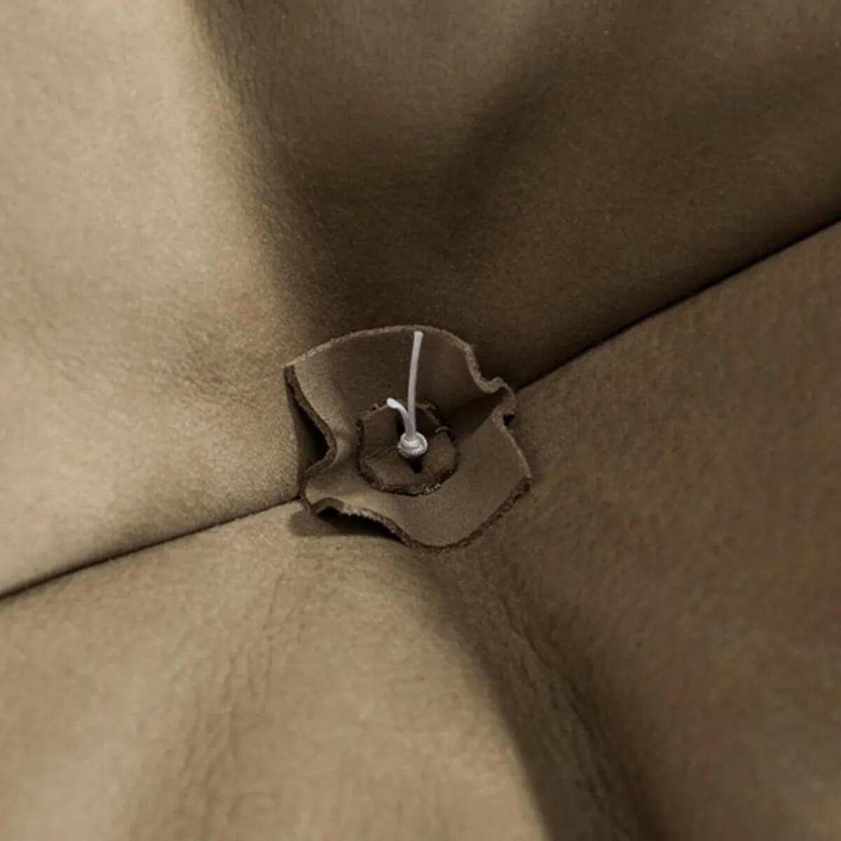 Close-up details of Anastasia leather 3-seater sofa highlighting premium leather texture