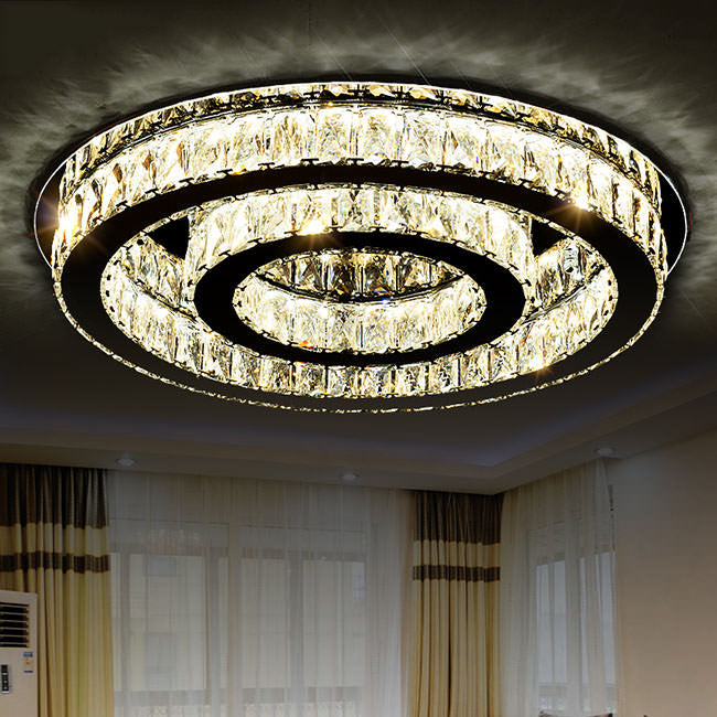 Aria LED chandelier by Lux Decor Australia, bottom view showcasing intricate crystal arrangement and glow