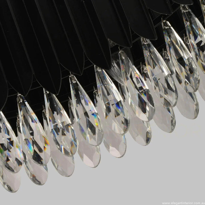 Detail view of Aura luxury modern pendant light with crystal accents in an elegant interior in Australia