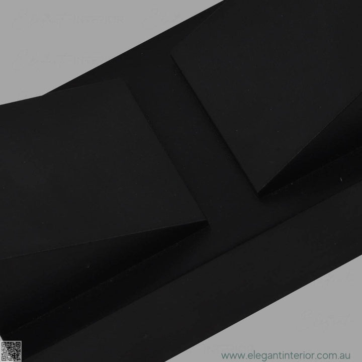 Detail view of Avon 1210 wall light lamp, highlighting warm light and elegant modern design