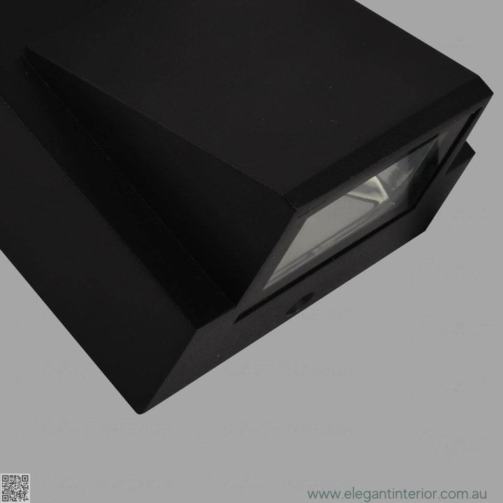 Light view of Avon 1210 wall light lamp, featuring warm glow and elegant modern design