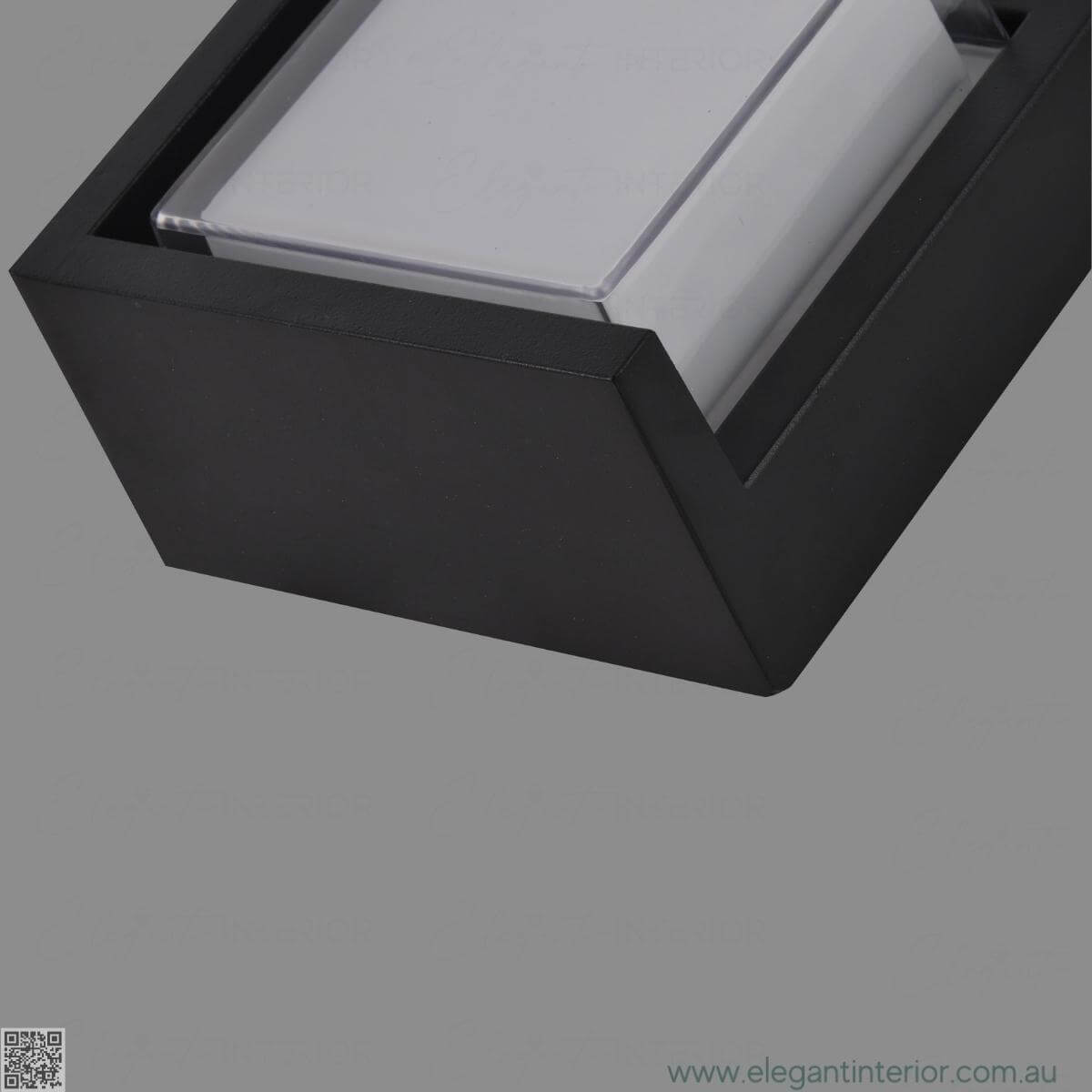 Head side detail view of Avon 1212 wall light lamp on, highlighting elegant design and glow