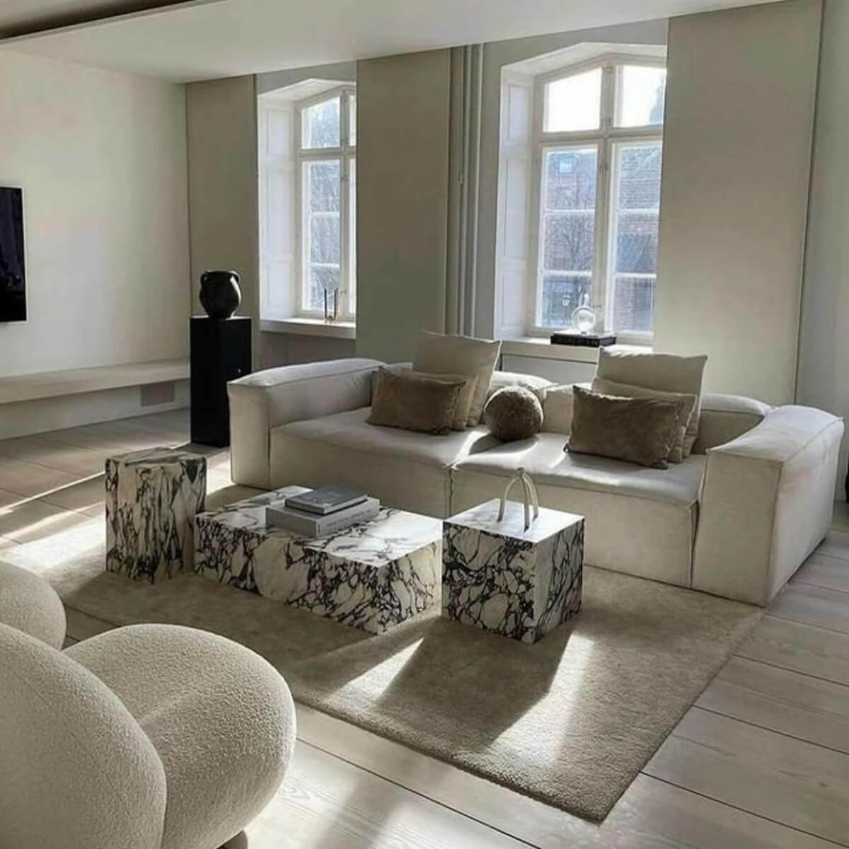 Calacatta Viola marble stone coffee table set in elegant living room setting
