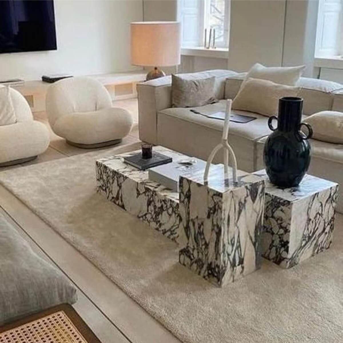 Side view of Calacatta Viola marble stone coffee table set showcasing elegant design