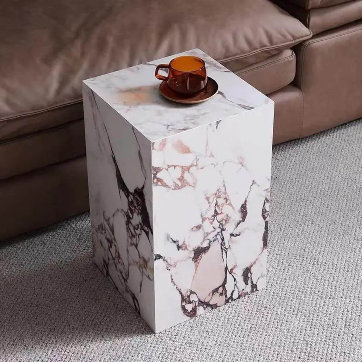 Calacatta Viola marble stone coffee table set styled in a luxurious living room interior