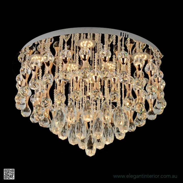 Clara flush mount ceiling light turned on, illuminating a contemporary interior