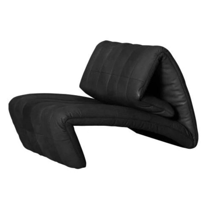 Side view of black Desede leather armchair in Australia showcasing sleek, elegant design