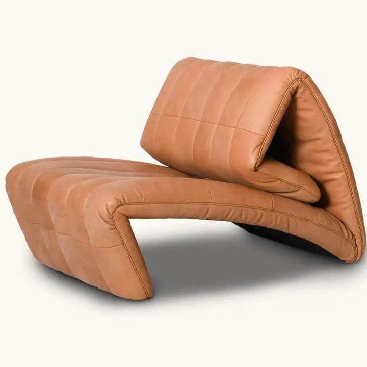 Side view of brown Desede leather armchair in Australia highlighting sleek, elegant design