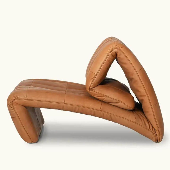 Side view of brown Desede leather armchair in Australia showcasing rich color and sleek design