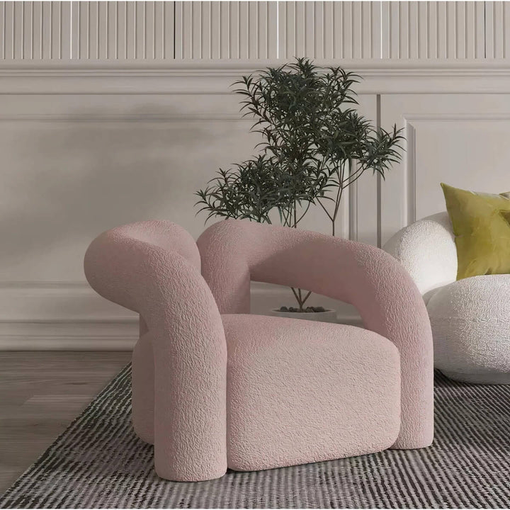Side view of Asher designer armchair highlighting sleek modern design and ergonomic comfort