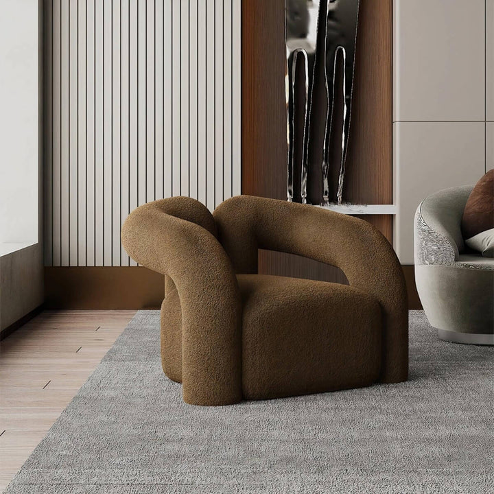 Side view of Asher designer armchair showcasing sleek lines and modern comfortable design