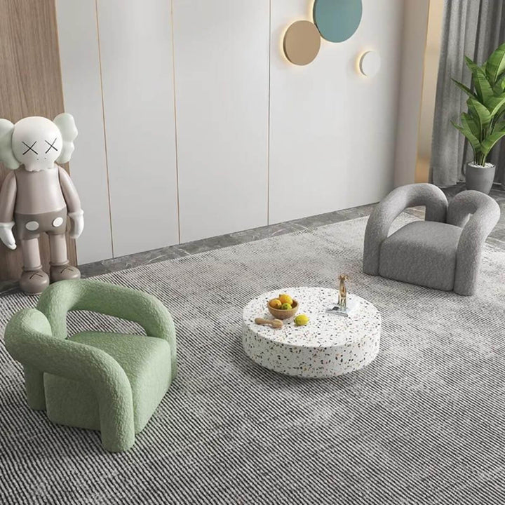 Top view of Asher designer armchair showcasing sleek contours and modern design
