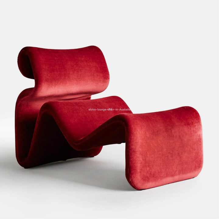 Side view of red Electro lounge chair in Australia showcasing bold color and sleek design
