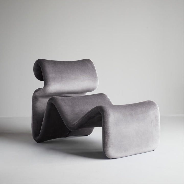 Side view of gray Electro lounge chair in Australia showcasing sleek and modern design