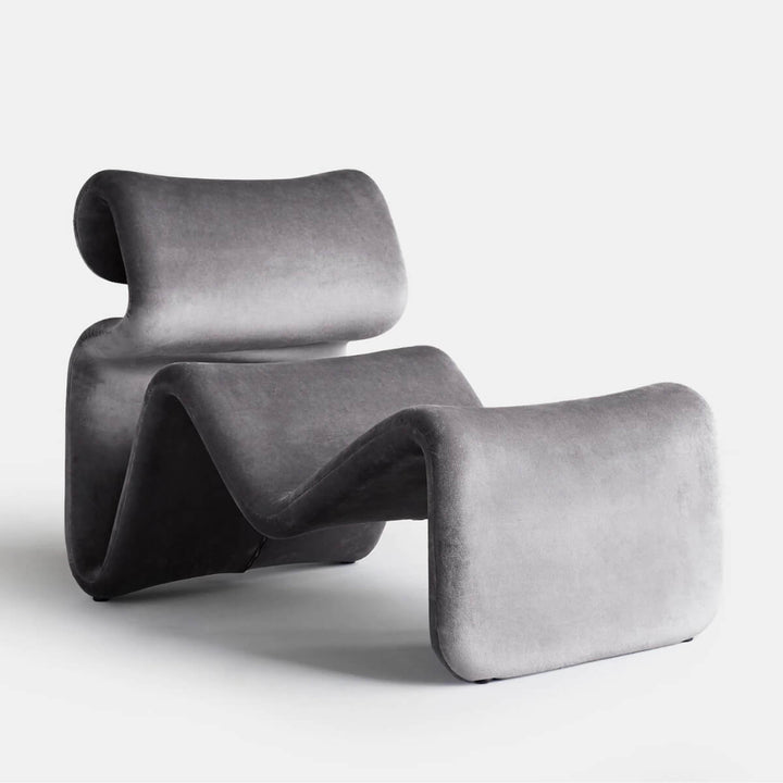 Side view of gray Electro lounge chair in Australia highlighting modern sleek design
