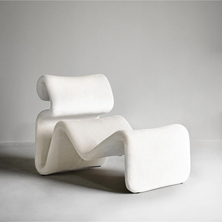 Side view of white Electro lounge chair in Australia showcasing sleek modern design