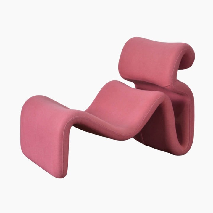 Side view of Electro lounge chair in muted pink, showcasing modern design in Australia