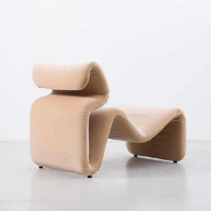Back view of cream Electro lounge chair in Australia highlighting soft tone and sleek design