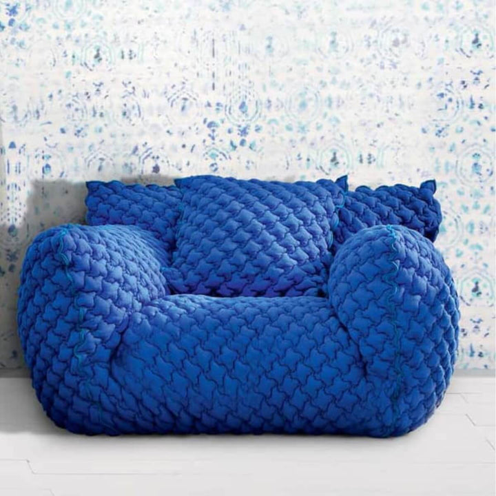 Detailed front view of Gabriella sponge embroidery lounge 1-seater chair highlighting texture